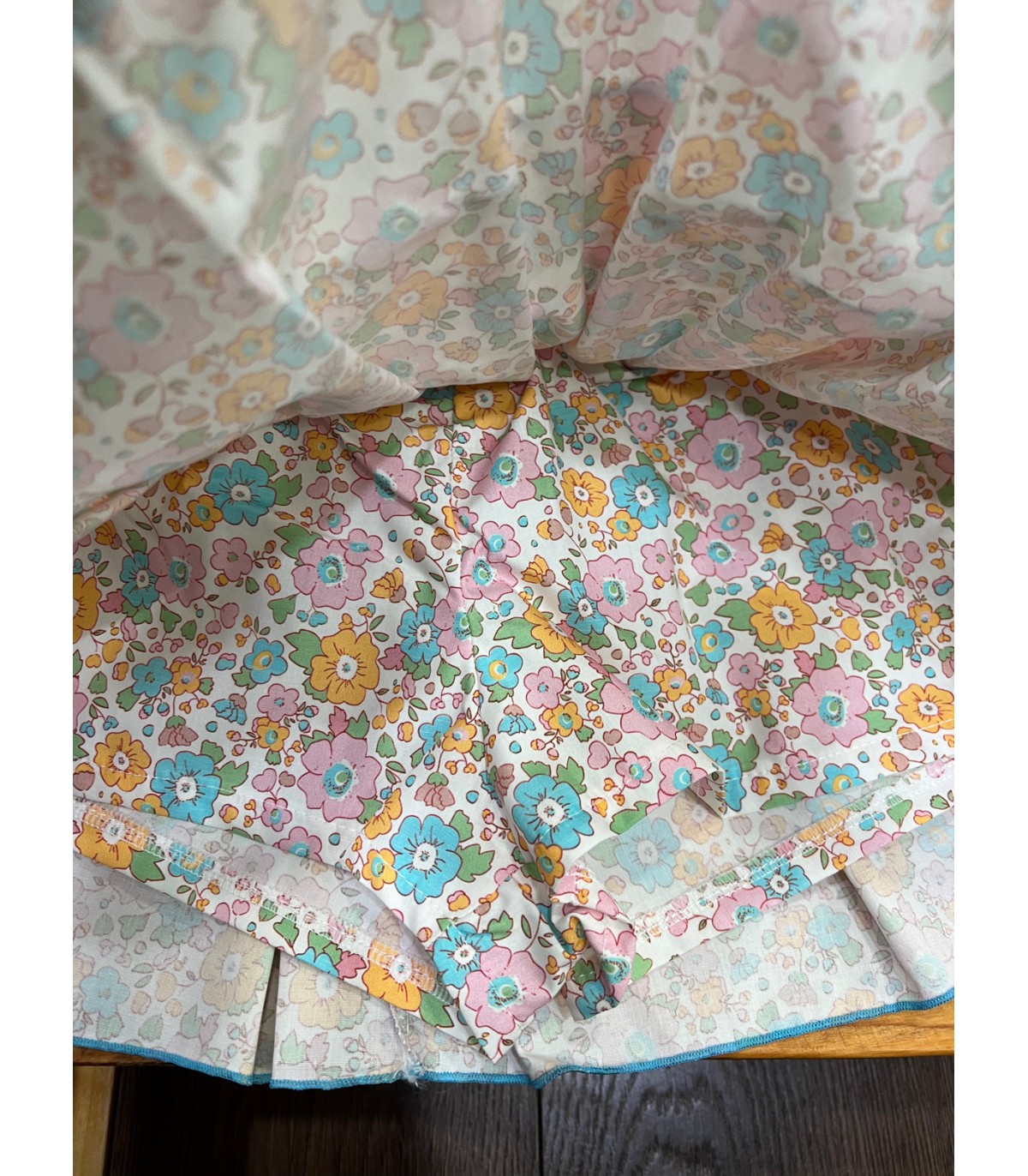 Conjunto niña de camiseta y falda pantalón flor turquesa de Mon Pet...